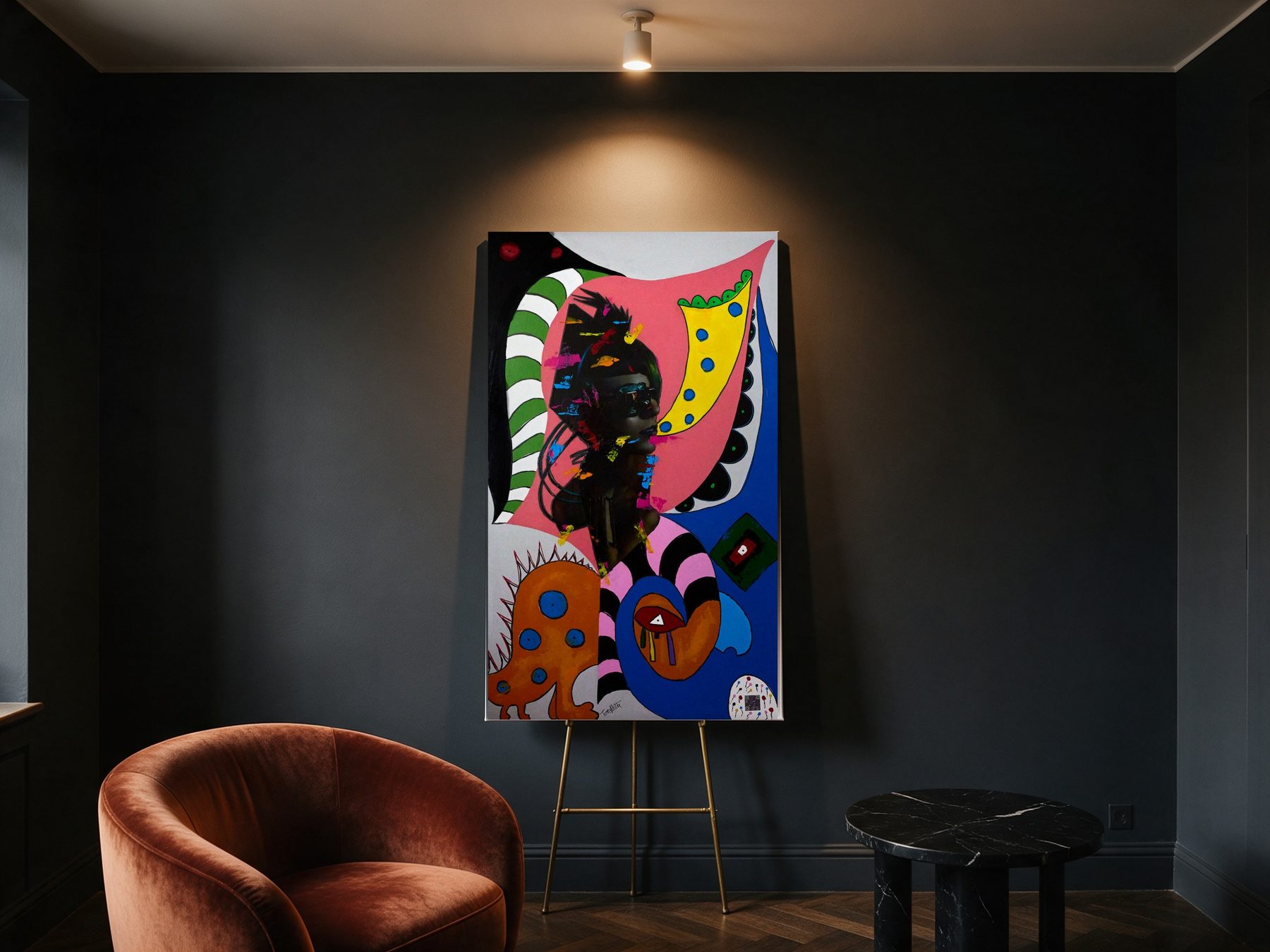 A painting on an easel in a dark room with a velvet armchair